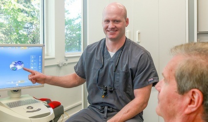 Dr. Calderwood with dental implant technology
