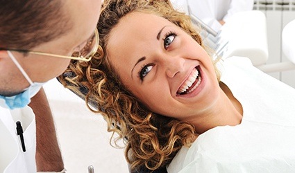 Smiling woman in dental chair